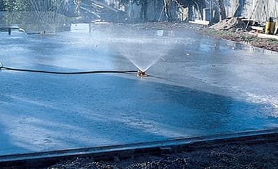 Spraying/Sprinkling method of curing concrete