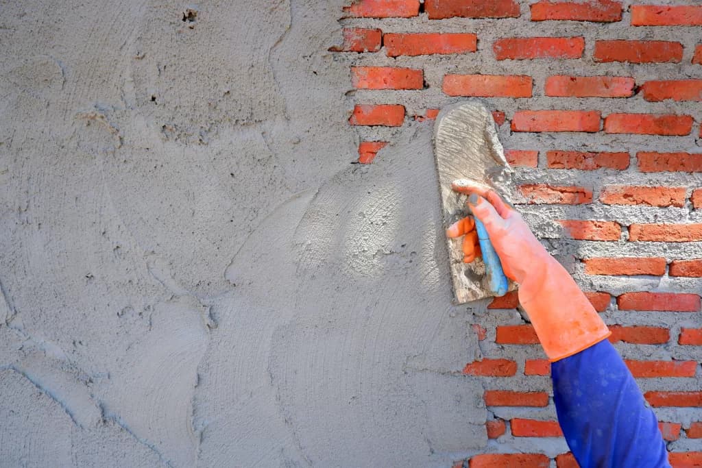 Wall plastering with cement